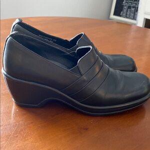Dansko Black Mules with Wedge Heel and Leather Finish